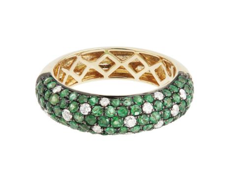 An emerald and diamond set bandthe band partially pavé set with emeralds and diamonds, apparently unmarkedRing size M/N; esti