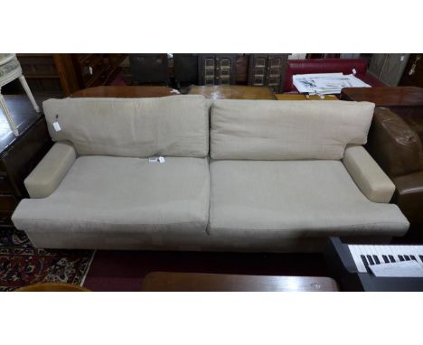 A large contemporary 4 seat sofa, with stone linen upholstery 