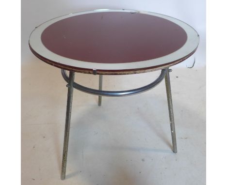 An early 20th century lamp table by J M Doughty, with red glass top and mirrored border, raised on chrome legs, H.59 D.60cm 