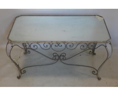 A vintage French wrought iron coffee table with mirrored top, H.53 W.98 D.56cm 