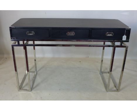 A campaign style 2 drawer console table, raised on chrome base, H.79 W.120 D.45cm 