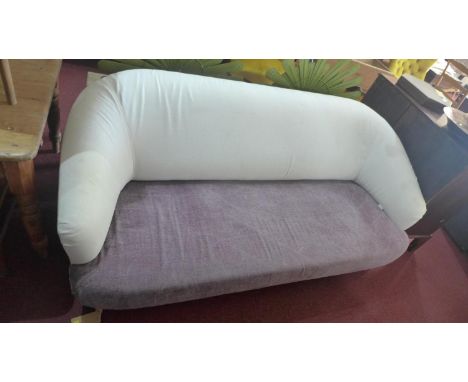 A Designers Guild 3 seater sofa, with mauve and cream upholstery, on tapered legs, H.80 W.200 D.95cm 