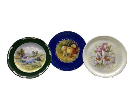  Keith Hancock - Blue ground plate painted with a centre panel of fruit D22cm, inscribed on the reverse, another by the same 