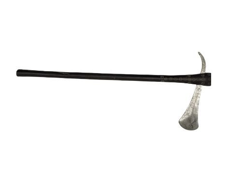 African axe, the wooden shaft decorated with roundels L57cm