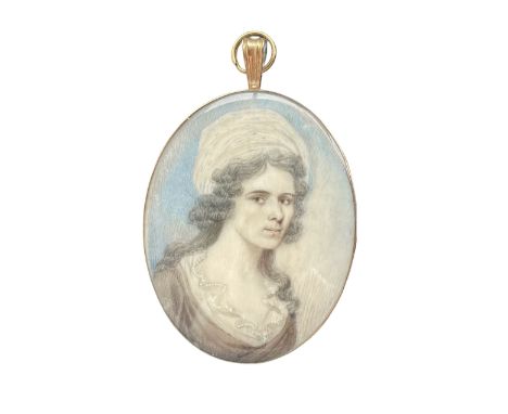 Late 18th century English school oval miniature head and shoulders portrait on ivory of a lady wearing a turban in gilt frame