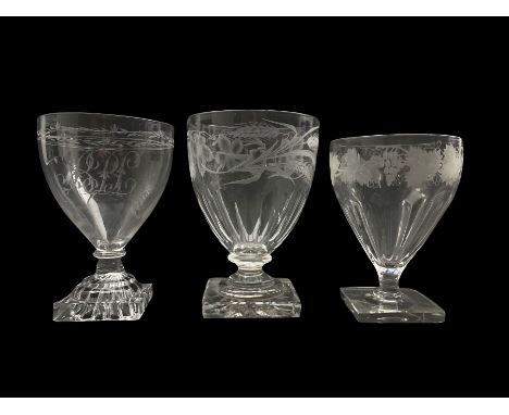 Early 19th century glass rummer etched with a monogram on a lemon squeezer foot, another etched with vines on a square foot a