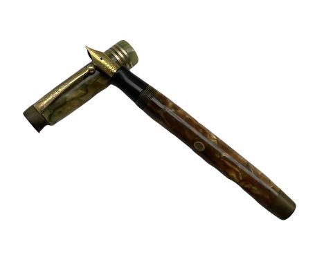 Parker, Duofold Lucky Curve, a green and brown marbled fountain pen, the cap with a gilt clip and triple cap band, button fil