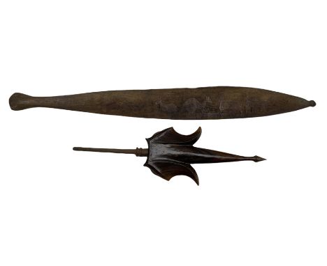 Australian Aboriginal spear thrower carved with kangaroo L82cm and a Malayan trident dagger with wooden scabbard L50cm