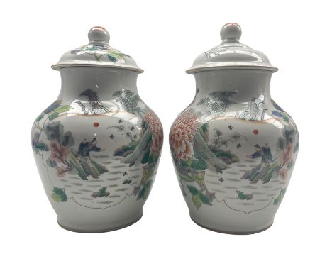 Pair of 19th century Chinese Qing dynasty vases and covers decorated with figures, lake landscapes, flowers and scrolls and w