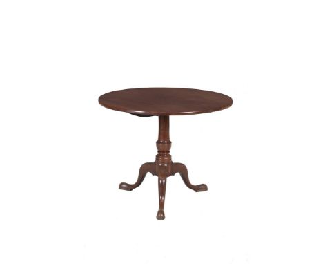 A LARGE 19TH CENTURY MAHOGANY CIRCULAR SNAP-TOP SUPPER TABLE with plain rim, raised on baluster turned centre pillar tripod s