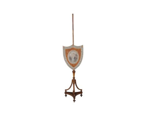 A GEORGE IV PAINTED SATINWOOD POLE SCREEN, the shell shaped panel inset with a stipple engraving after Bartolozzi within a pr