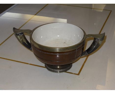 A BEECHWOOD AND SILVER PLATED TWO HANDLED CENTRE BOWL, early 20th century, fitted with circular ceramic liner, highland cattl