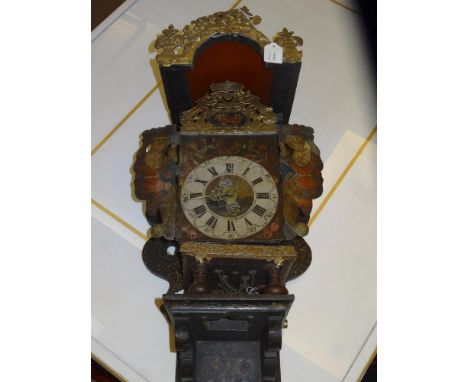 A CONTINENTAL 18TH CENTURY STYLE BRACKET RECTANGULAR CLOCK, the bracket having an arched gilt metal mounted canopy, the paint