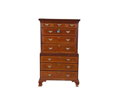 AN EARLY 19TH CENTURY INLAID MAHOGANY CHEST ON CHEST, with moulded dentil cornice above three short and three long drawers fl