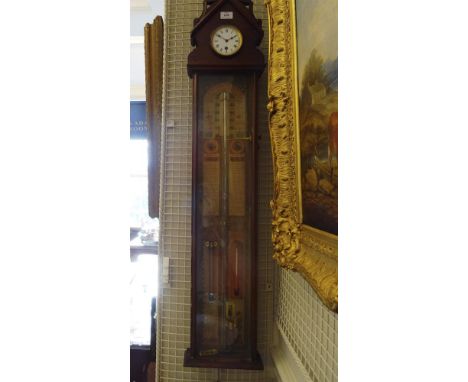 A MAHOGANY CASED ADMIRAL FITZROY BAROMETER, late 19th century, of upright rectangular form, headed by an inset clock, fitted 
