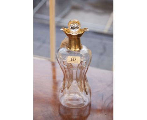 A VICTORIAN SILVER MOUNTED CLEAR GLASS DECANTER, the collar hallmarked for London 1891 and with ball stopper and having a mod