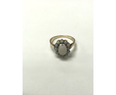 A 9ct gold and Opal ring, the approximate ring size is o.