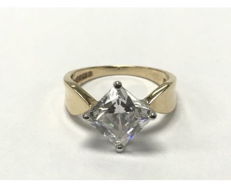 A 14ct yellow gold ring set with cubic zirconia. The approximate ring size is M - NO RESERVE