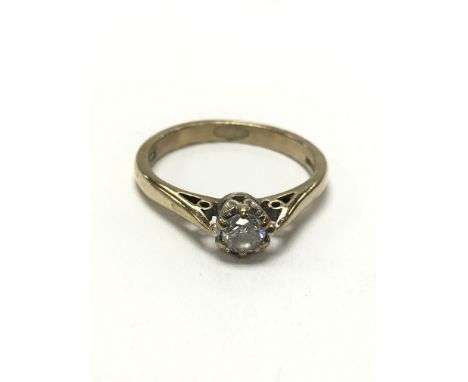 A 9ct gold ring inset with a single brilliant cut diamond. The approximate ring size is M.