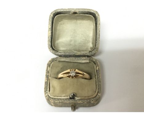 An 18carat gold ring set with a small diamond approximately 0.20 of a carat.weight 3.7g ring size R-S