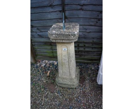 Stone sundial on plinth