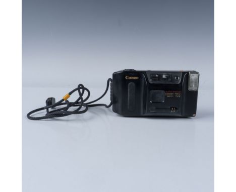 Canon Sprint 35mm compact film camera featuring a Canon 35mm f/3.5 lens with autofocus and macro capability at 45cm for detai