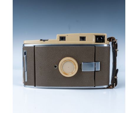 Introduced in the late 1950s as part of Polaroid's revolutionary instant camera series. This particular model features a fold