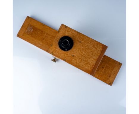 A vintage sequence camera crafted by Adam Hilger Ltd, London, a renowned manufacturer of scientific equipment. Made in Englan