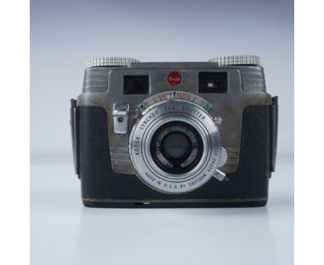 A Kodak Signet 35 rangefinder camera, featuring a 44mm f/3.5 Ektar lens and Synchro 300 shutter. Manufactured by Eastman Koda