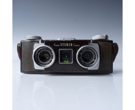Vintage Kodak Stereo Camera manufactured in 1954, designed to capture realistic 3D images using 35mm film. This model feature