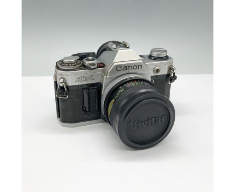 A timeless Canon AE-1 35mm film camera paired with a Vivitar Auto Wide-Angle 28mm f/2.8 lens. Introduced in 1976, the Canon A