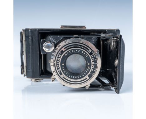 This is a vintage Kodak Vollenda folding camera, likely from the early-to-mid 20th century, featuring a black leatherette bod