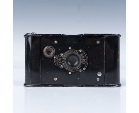 A vintage Kodak Vest Pocket Autographic folding camera, introduced in the early 20th century. This compact model features a m