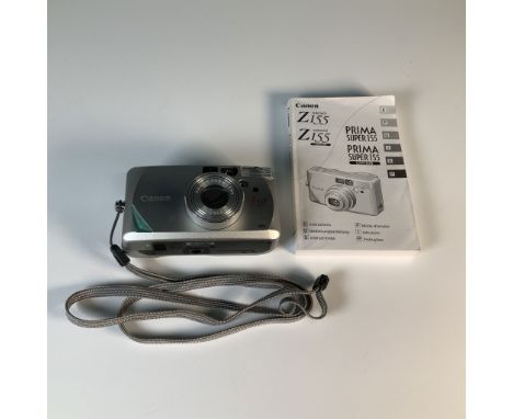 Canon Sure Shot Z155 Caption 35mm film camera featuring a Canon zoom lens with a focal range of 37-155mm and a built-in flash