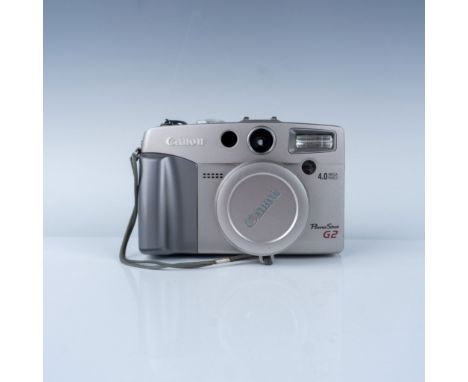 Canon PowerShot G2 digital camera featuring a 4.0-megapixel resolution, equipped with a 7-21mm f/2.0-2.5 Canon Zoom Lens. Thi