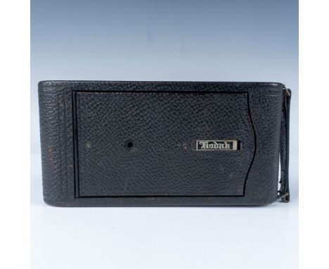 Early 20th-century Kodak Folding Pocket camera featuring a classic black leather bellows design and original embossed Kodak c