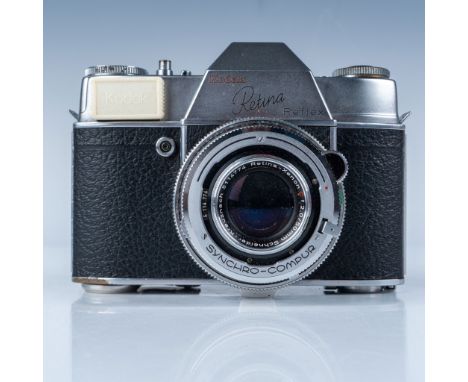 This is a vintage Kodak Retina Reflex camera, a hallmark of mid-20th-century precision photography. Manufactured by Kodak AG 