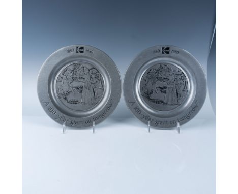 A beautifully crafted pewter plates commemorating Kodak’s centennial anniversary. The plate features an embossed design depic