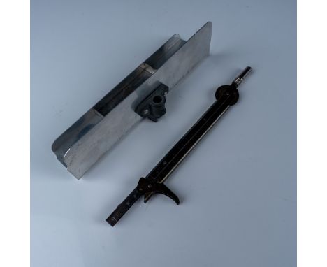 Vintage handheld powder flash dispenser featuring an adjustable metal frame and a detachable aluminum reservoir for precise m