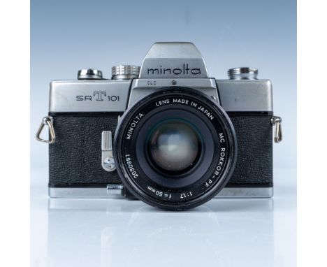 This auction features a Minolta SR-T 101 35mm single-lens reflex (SLR) film camera, a classic model introduced in 1966 that q