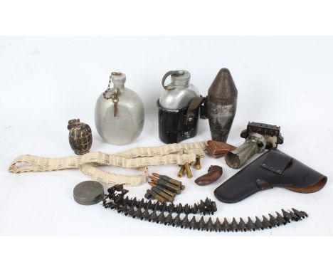 Mixed lot of militaria, inert small calibre ammunition, water bottle and mug, grenade casing, pistol and rifle furniture, etc