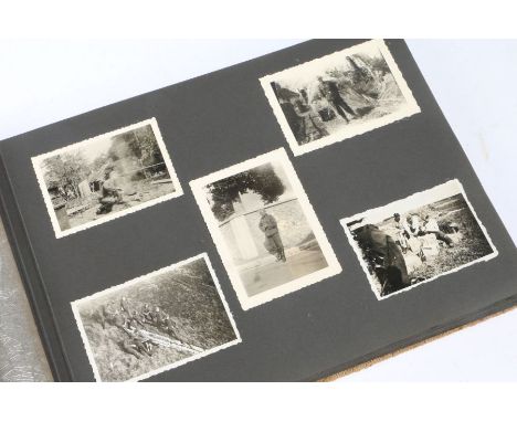 Second World War German photograph album, fabric covered boards, photos of Army, Luftwaffe and RAD personnel, in training, on
