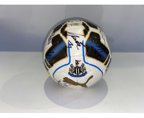 A Newcastle United football, with signatures