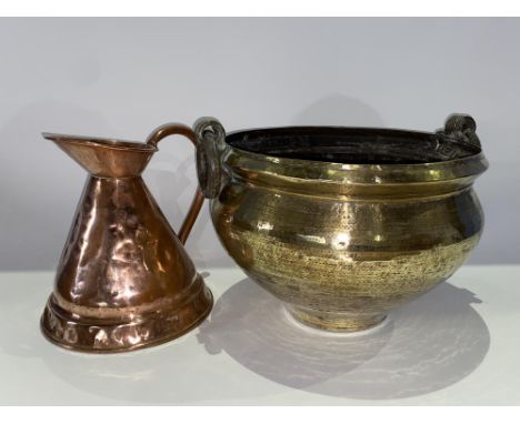 A Victorian copper measure and a brass planter of planished appearance, measuring 25cm H