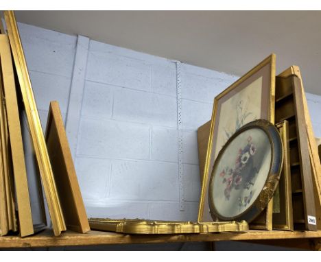 Shelf of mirror and prints