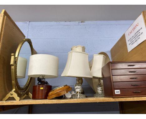 Shelf of table lamps etc