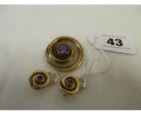 Silver amethyst brooch and ear clip set with gilded whorl mounts