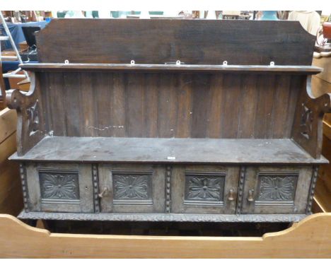 Carved oak hanging coat rack and hat cupboard 