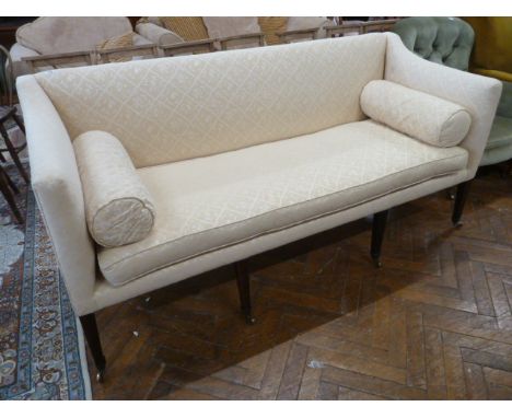 Georgian upholstered sofa on tapered legs with cylinder cushions 