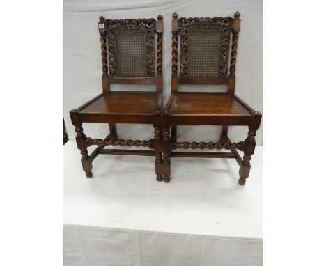 Pair carved oak cane back panel seated side chairs